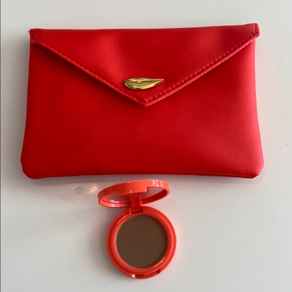 Ipsy make up bag and item cheek money bronzer